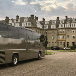 Coast to Coast Travel coach parked at Gleneagles Hotel in Scotland